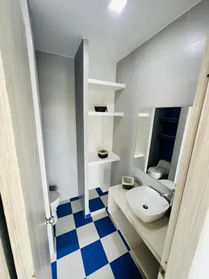 a small bathroom with a sink and a toilet at AzulRest Casa de Verano in Santa Veronica