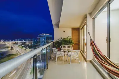 a balcony with a table and chairs on it at Frente al Mar home office 7B in Cartagena de Indias