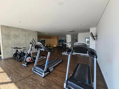 a gym with several exercise bikes in a room at Great apartment in Bocagrande with sunset & beach view in Cartagena de Indias