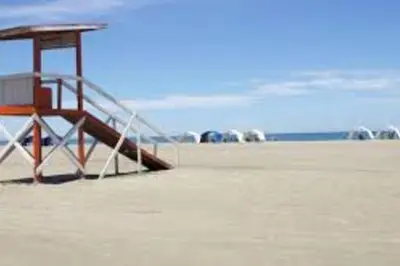 a slide on a sandy beach with the ocean in the background at Luxury apartment in Morros - Cartagena de Indias in Cartagena de Indias