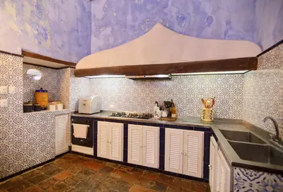 a kitchen with a sink and a counter top at 4CB-1 CASA COLONIAL DE 4 HABITACIONES EN EL CENTRO HISTORICO DE CARTAGENA in Cartagena de Indias