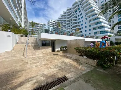 a building with stairs in front of a large building at Comodo Apartamento en morros epic! in Cartagena de Indias