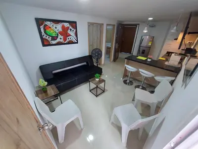 an aerial view of a living room with a couch and chairs at Apartamento en cartagena in Cartagena de Indias