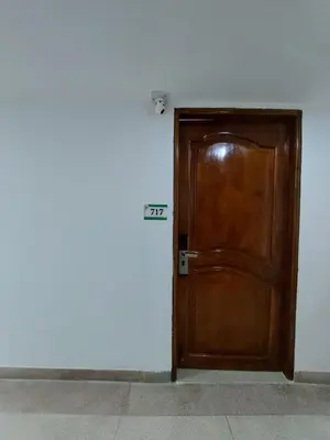 a wooden door in a room with a wall at Apartamento en cartagena in Cartagena de Indias