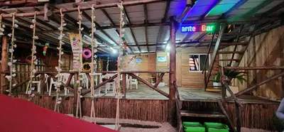 a building with a gym with a sign that reads cure beer at Ecohotelhector in Playa Blanca