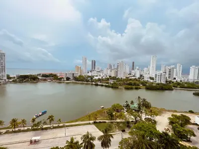 a large body of water with a city in the background at Cartagena apto estudio piso 12 frente a la playa in Cartagena de Indias