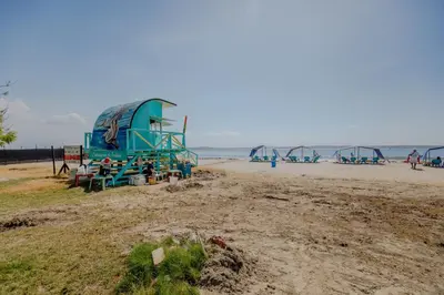 a playground on a beach next to the ocean at Mini departamento a una cuadra de la playa y de la bahia de Bocagrande in Cartagena de Indias