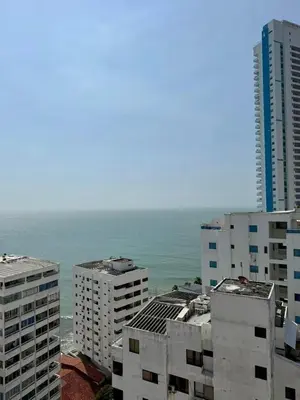 a view of the ocean from a city with buildings at El Laguito, Edificio El Conquistador in Cartagena de Indias