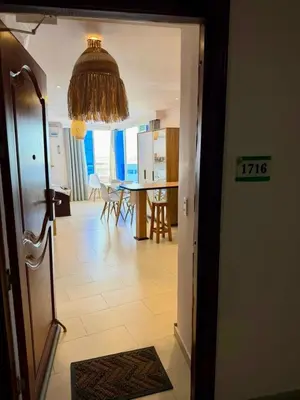 a view of a living room and a dining room at El Laguito, Edificio El Conquistador in Cartagena de Indias