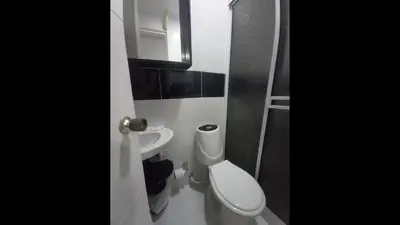 a bathroom with a toilet and a sink at Bm-3 room near the sea with air conditioning and WIFI in Cartagena de Indias