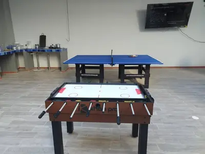 a ping pong table in a room with at Bm-7 room near the sea with air conditioning and WIFI in Cartagena de Indias