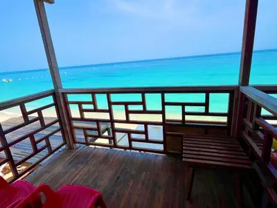 a balcony with a view of the ocean at Roma beach in Cartagena de Indias
